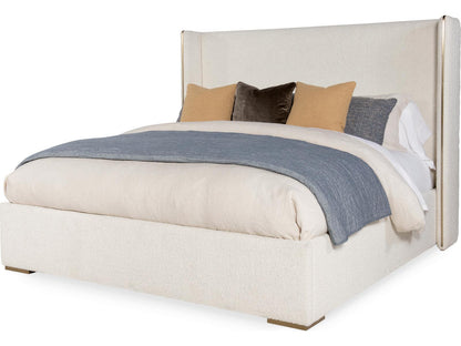 Cadence Upholstered Wing King Bed with Antique Brass Trim