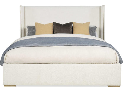 Cadence Upholstered Wing King Bed with Antique Brass Trim